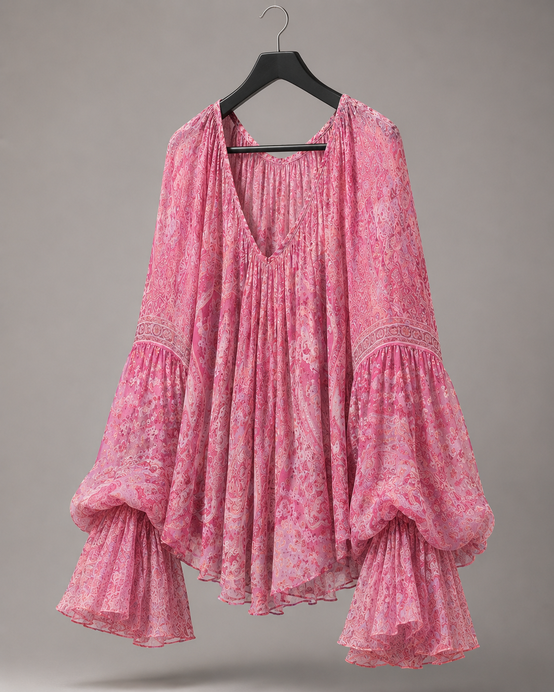 Roséfarbene Bluse mit Trompetenärmeln